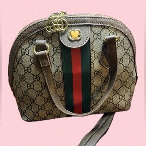 NEW LISTING!!!
Brown and Green Women's Bag